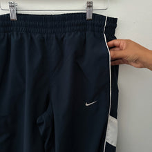 Load image into Gallery viewer, Nike wind runner pants
