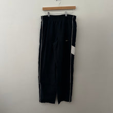 Load image into Gallery viewer, Nike wind runner pants
